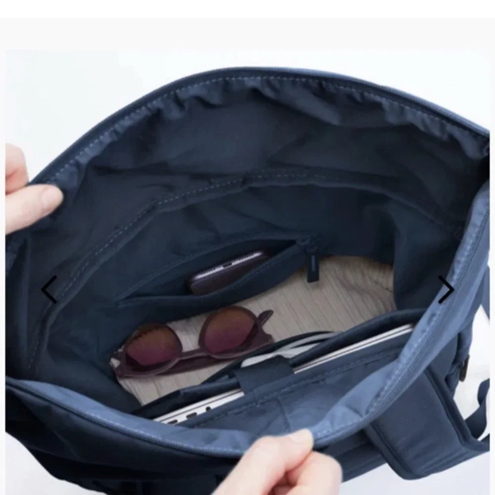 Blue Urban Roll-Top Backpack with Modern Design